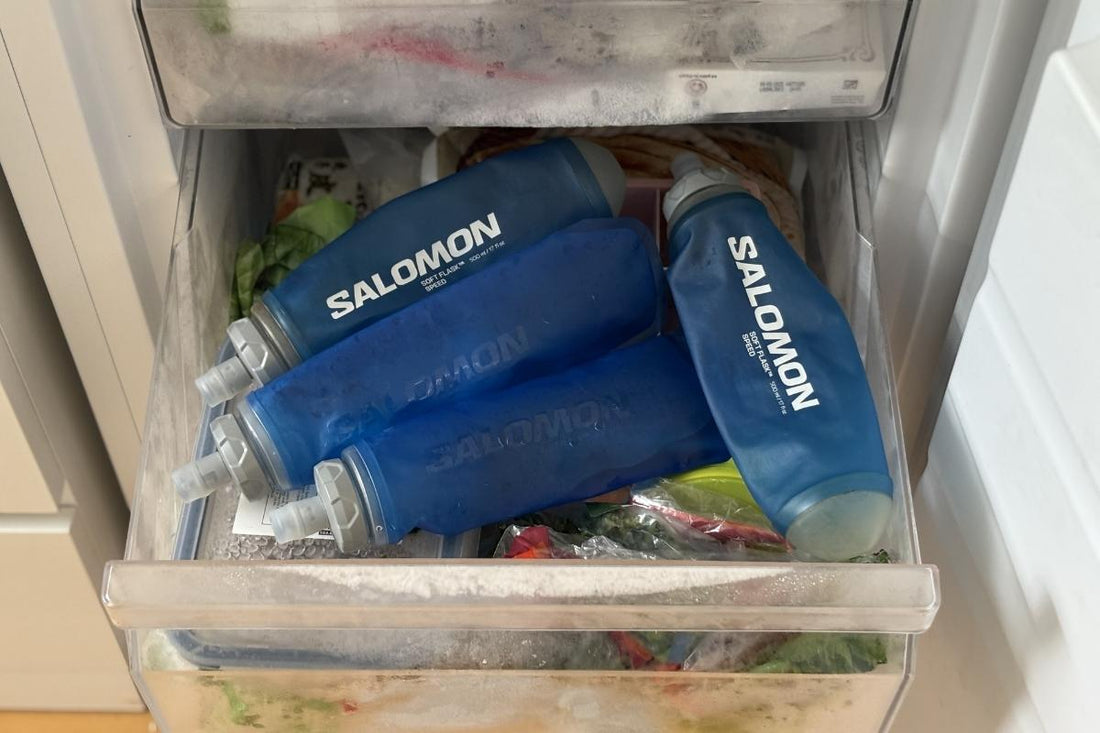 4 soft flasks of Salomon laying in a freezer